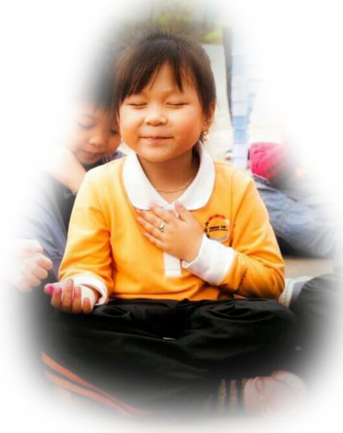 happy-meditating-oriental-child